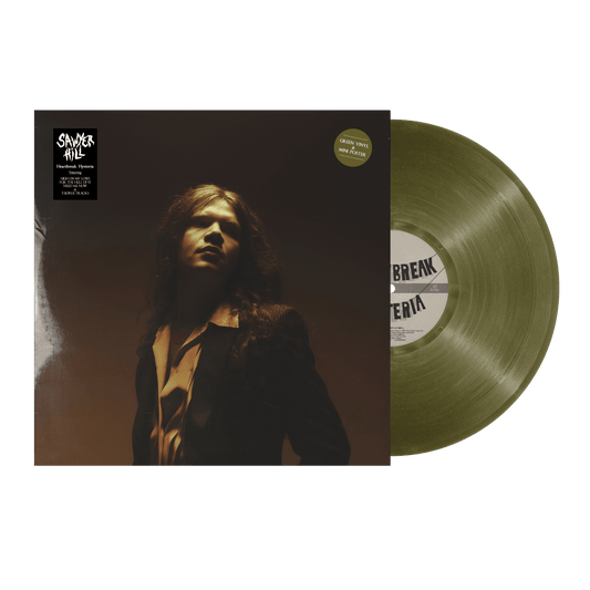 HeartBreak Hysteria Deluxe Green Vinyl record with a dark cover featuring an image of Sawyer Hill.